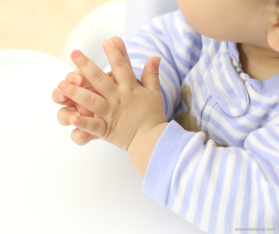 Baby praying before meal