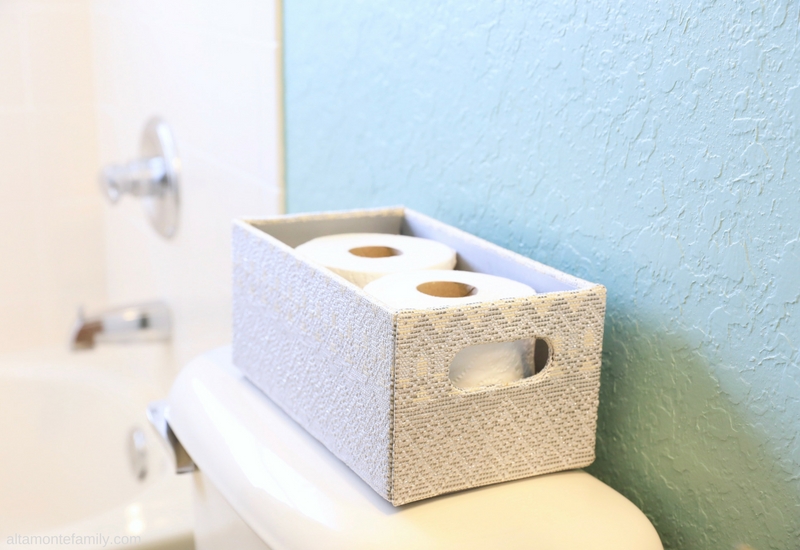 Holiday Hosting Tips - Toilet Paper Storage Bin Idea