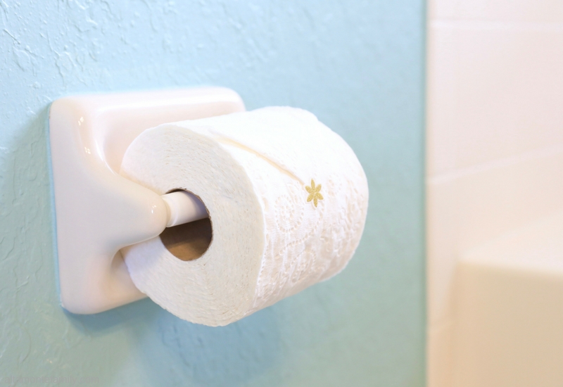 Holiday Hosting Tips - Toilet Paper Sticker Idea